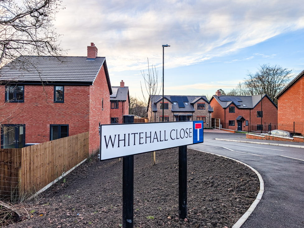 Photo of the view into Whitehall Close, Berry Hill, showing the new street sign