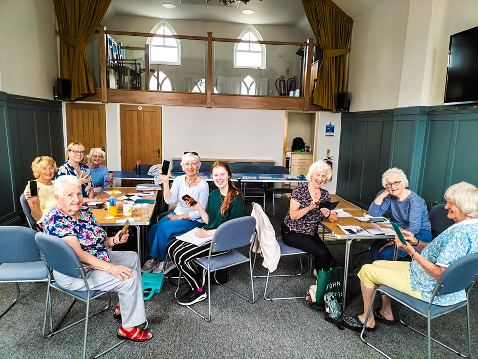 Members of the Gotherington digital drop-in with GRCC's Louise Fletcher (centre)