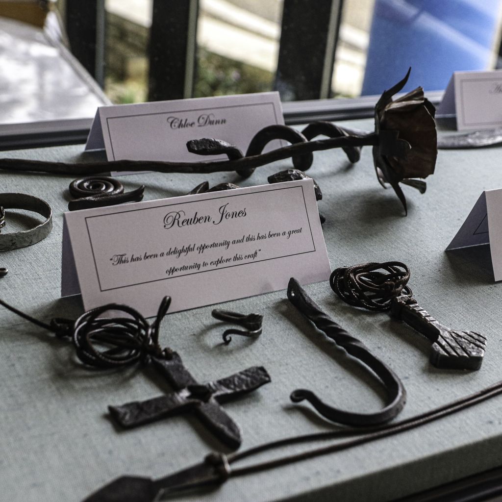 students' blacksmithing work on display at Stroud's Museum in the Park