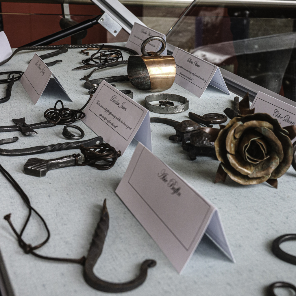 students' blacksmithing work on display at Stroud's Museum in the Park