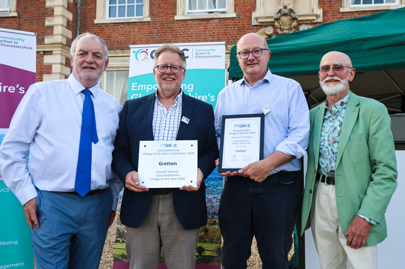 Representatives of Gretton receive their prize from GRCC Chair and Vice Chair of Trustees