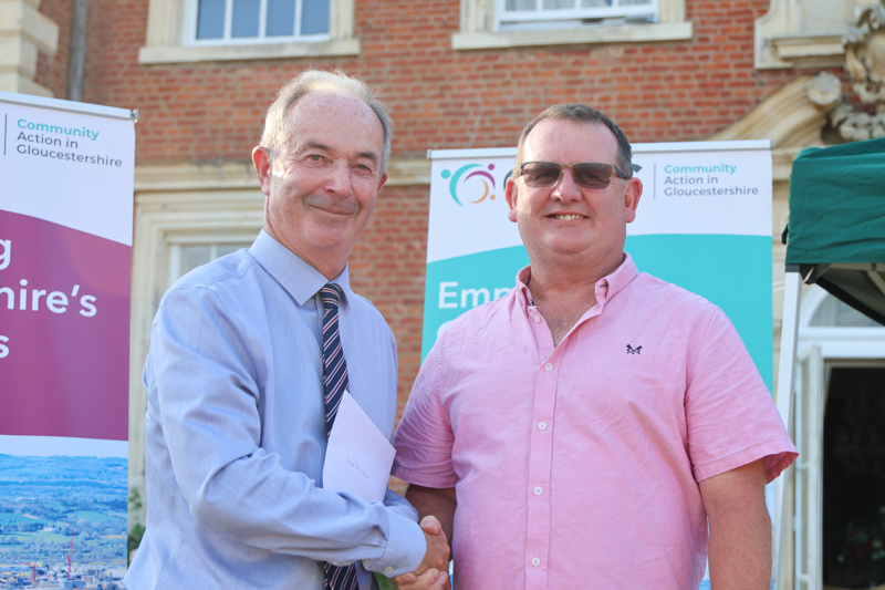 Berry Hill representative receives the Grand Prize Draw prize from Richard Bradley