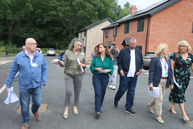 Jenny Riddell-Carpenter tours Whitehall Close in Berry Hill, Forest of Dean with representatives of the partner organisations who enabled this rural affordable housing development to be built