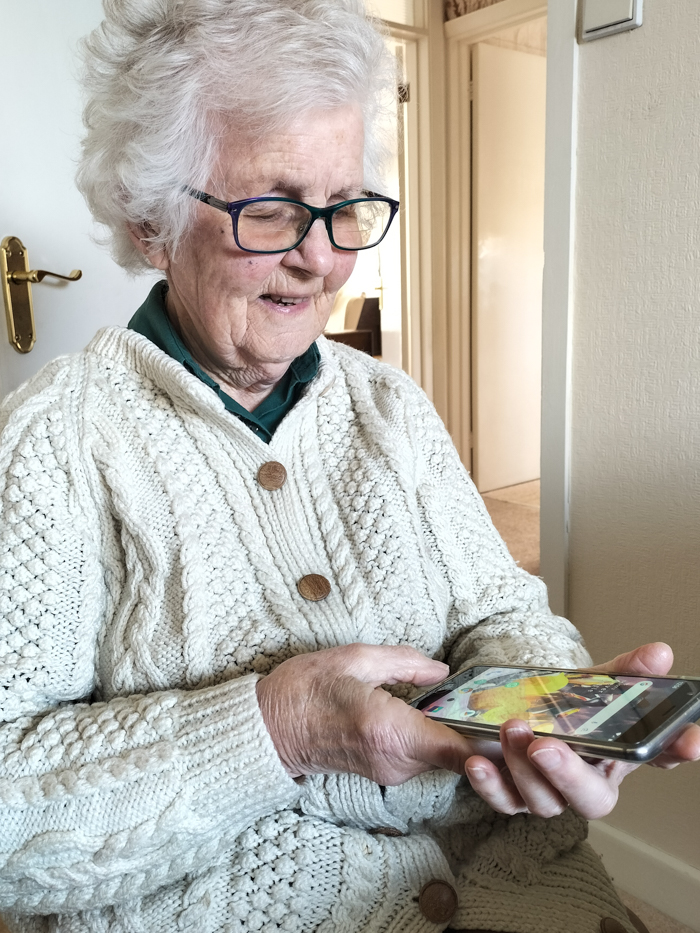 Elderly lady using a smartphone
